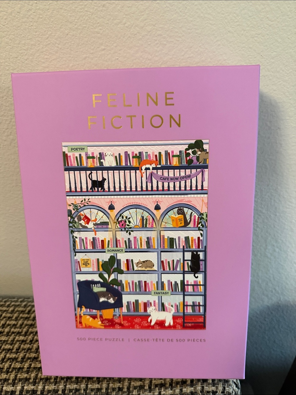 Feline Fiction 500-piece jigsaw puzzle by Hobbry. Complete with poster